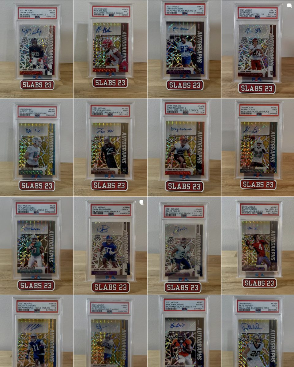 A grid of PSA-graded 2021 Mosaic rookie autograph cards on Slabs 23 display stands, including Frank Darby, Nick Bolton and Kylen Granson