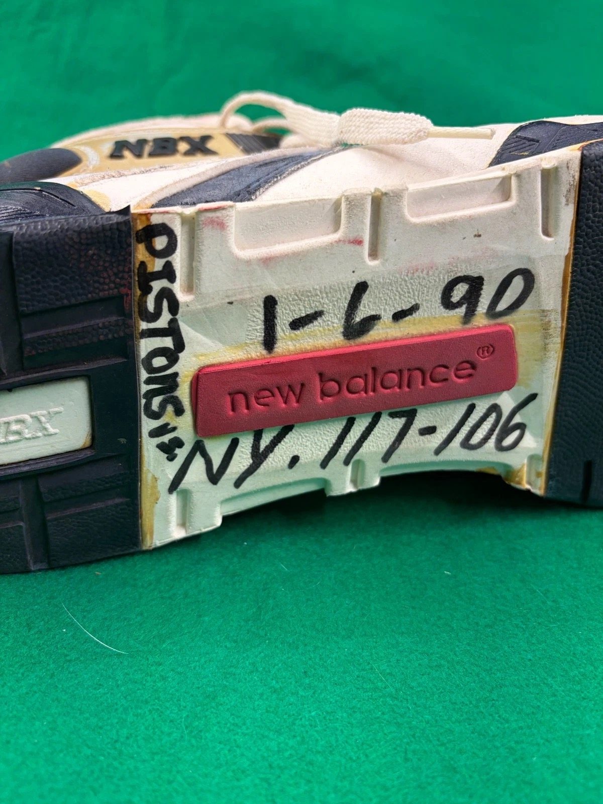 Soles of both shoes marked 1-6-90