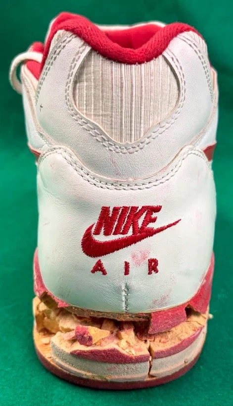 Heel of the sneaker with Nike Air logo and midsole crumbling